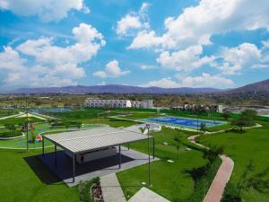 an overhead view of a park with a pool at Xochitepec Residencial in Atlacholoaya