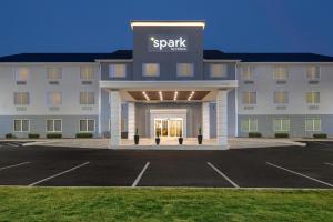 a building with a parking lot in front of it at Spark by Hilton Douglasville Atlanta West in Douglasville