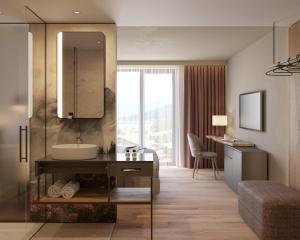 a bathroom with a sink and a mirror at Ziach & Candy Grossarl in Grossarl