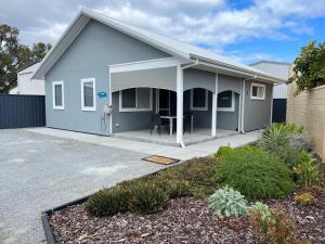 a small house with a garage at Jurien Beachfront Chalets in Jurien Bay
