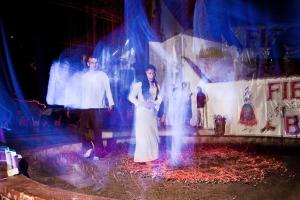 a woman in a white dress standing on a stage at Motel Hanat in Saints Constantine and Helena +20 photos