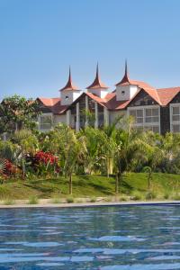 a view of a resort from the water at Radisson Resort & Spa Sasan Gir in Junagadh