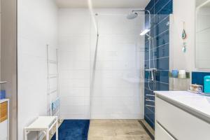 a bathroom with a shower and a sink at Chambre d'hôtes Marine in Binic +18 photos