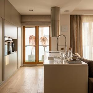a kitchen with a sink and a counter top at Sky & Spa Luxury Residence in Warsaw +17 photos