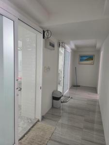 a hallway with a glass shower in a house at Near the Beach Cha-Am in Cha Am +85 photos