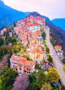 a large group of houses on a hill at Casa del Moro al Sacro Monte app1 in Varese +5 photos