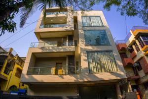 a tall building with balconies on the side of it at Shubhham Regency in kolkata