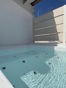 a pool of water in the middle of a room at Don Alfredo in Taranto