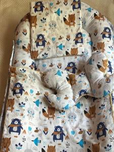 a baby crib with an owl pattern on it at Apartment Simo in Herceg-Novi