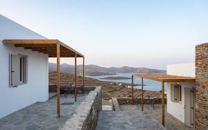 a house with a view of the ocean at Kythea Suites Kythnos in Kithnos