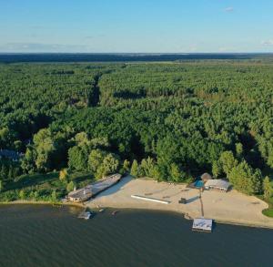 an aerial view of an island in the water at Secret River Rooms in Pereiaslav-Khmelnytskyi