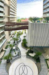 an overhead view of a building with a walkway at CĂN HỘ NGHĨ DƯỠNG CAO CẤP THE SÓNG VŨNG TÀU-THE SONG APARTMENT LeeHuy in Vung Tau