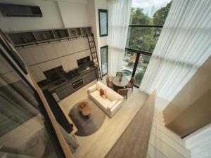 an overhead view of a living room with a couch at Luxury 2br Apt & Pool access in Panama City