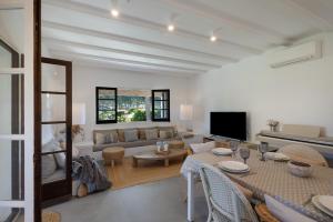 a living room with a couch and a table at Racó 24 in Pals