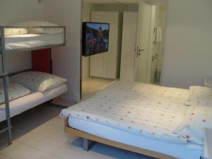 Voodi või voodid majutusasutuse Vista Resort Hostel toas