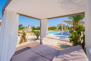 a view from the living room of a villa at Villa Kalia Luxury by HDSalento in Aradeo