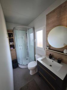 a bathroom with a shower and a toilet and a sink at SUNNY Rest Nest in Pakoštane +34 photos