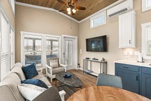 a living room with a couch and a table at Pigeon Forge Landing RV Resort in Pigeon Forge