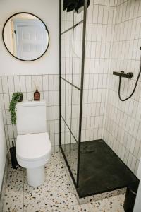 a bathroom with a toilet and a shower at Room 2 at The Firs in Backwell +8 photos