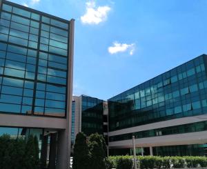 a building with glass windows on the side of it at Hotel Aristos in Zagreb