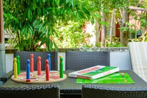 a table with a birthday cake with candles on it at Campsite & Holiday Resort Medveja -by Liburnia Hotels & Villas in Medveja