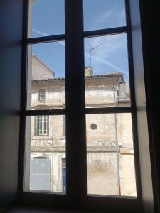 a view of a building from a window at casaisabel in Bordeaux