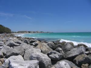 a group of rocks on a beach with the ocean at Fairfield Inn & Suites by Marriott Venice in Venice