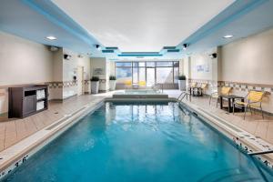 a large swimming pool in a hotel room at Fairfield Inn & Suites by Marriott Toronto Airport in Mississauga