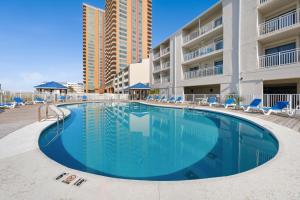 a large swimming pool in the middle of a building at Sugar Beach 313 in Gulf Shores