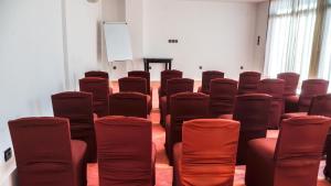 a group of chairs in a room with a podium at Ksar Shama - Atlas Mountain Retreat in Ouirgane +122 photos