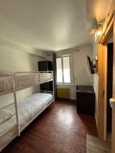 Un pat sau paturi într-o cameră la Hotel Au Spatial Centre Gare