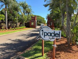 a sign on the side of a road at Charming Duplex Mauritius' Little Venice in Terre Rouge