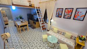 a living room with a couch and a table at AM's Home in Ninh Binh