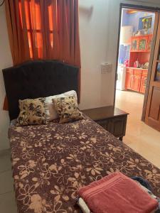a bedroom with a bed and a mirror at Roberto in Posadas