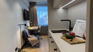 Televisor o centre d'entreteniment de ipartment Koeln Oper @HOME by Best Western