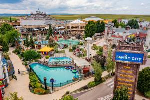 an amusement park with a swimming pool in a town at Jukebox Hotel in Znojmo
