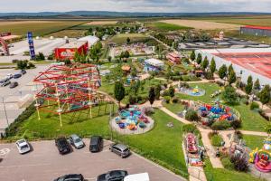 an aerial view of an amusement park with a roller coaster at Jukebox Hotel in Znojmo