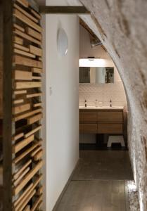 a bathroom with a sink and a mirror at TÉGED VÁRTALaK in Dörgicse +80 photos
