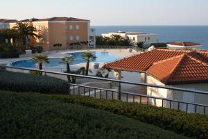 a view of a swimming pool from a building at Adriatic Apartment in Skiper Resort in Savudrija