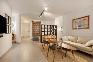 a living room with a couch and a table at Markt 5 in Lier