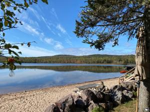 a beach with a view of a lake at The Boardwalk in Westfield Beach