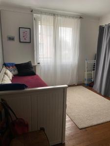 a bedroom with a bed and a window at Maison de ville quartier saint-pierre in Brest +3 photos