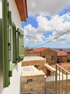 a view from the balcony of a building at Estia Vouni Boutique Houses in Vouni