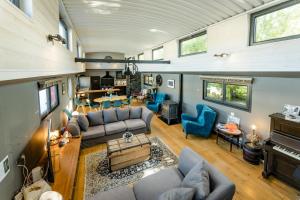 an overhead view of a living room in a tiny house at Ainos Louanges - Bail Partner in Auxerre