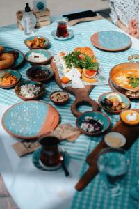 a table with plates of food on it at Nomad in Coimbatore