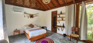 a bedroom with a bed in a room at Villas Boutique Antheia in La Orilla +20 photos