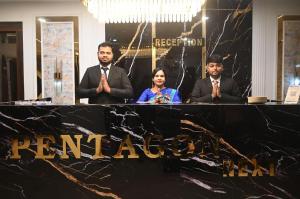 a group of three people sitting at a table at Pentagon Next Bhubaneswar in Bhubaneshwar