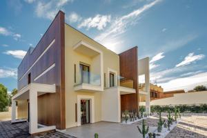 a house with a view of the front facade at Fly Suite Rome Airport in Fiumicino
