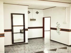 Khu vực sảnh/lễ tân tại Nur Muslim 3 Homestay At Kota Bharu