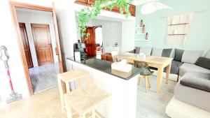 a living room with a couch and a table at Rami Home in Casablanca +55 photos